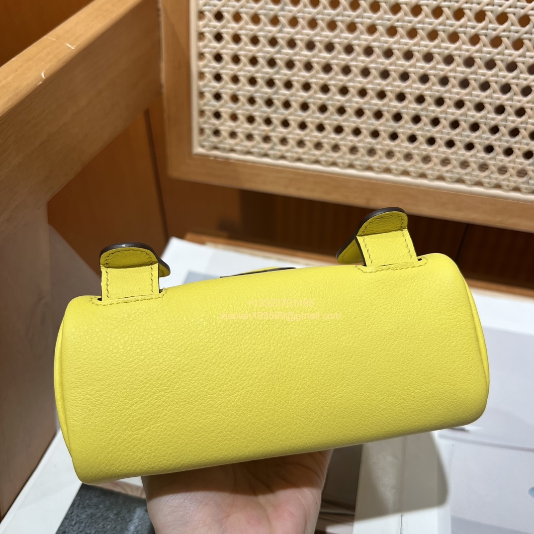 Hermès Kelly Doll Quelle Idole Picto Bag, Limited Edition in Lemon Yellow, crafted from Swift Leather.