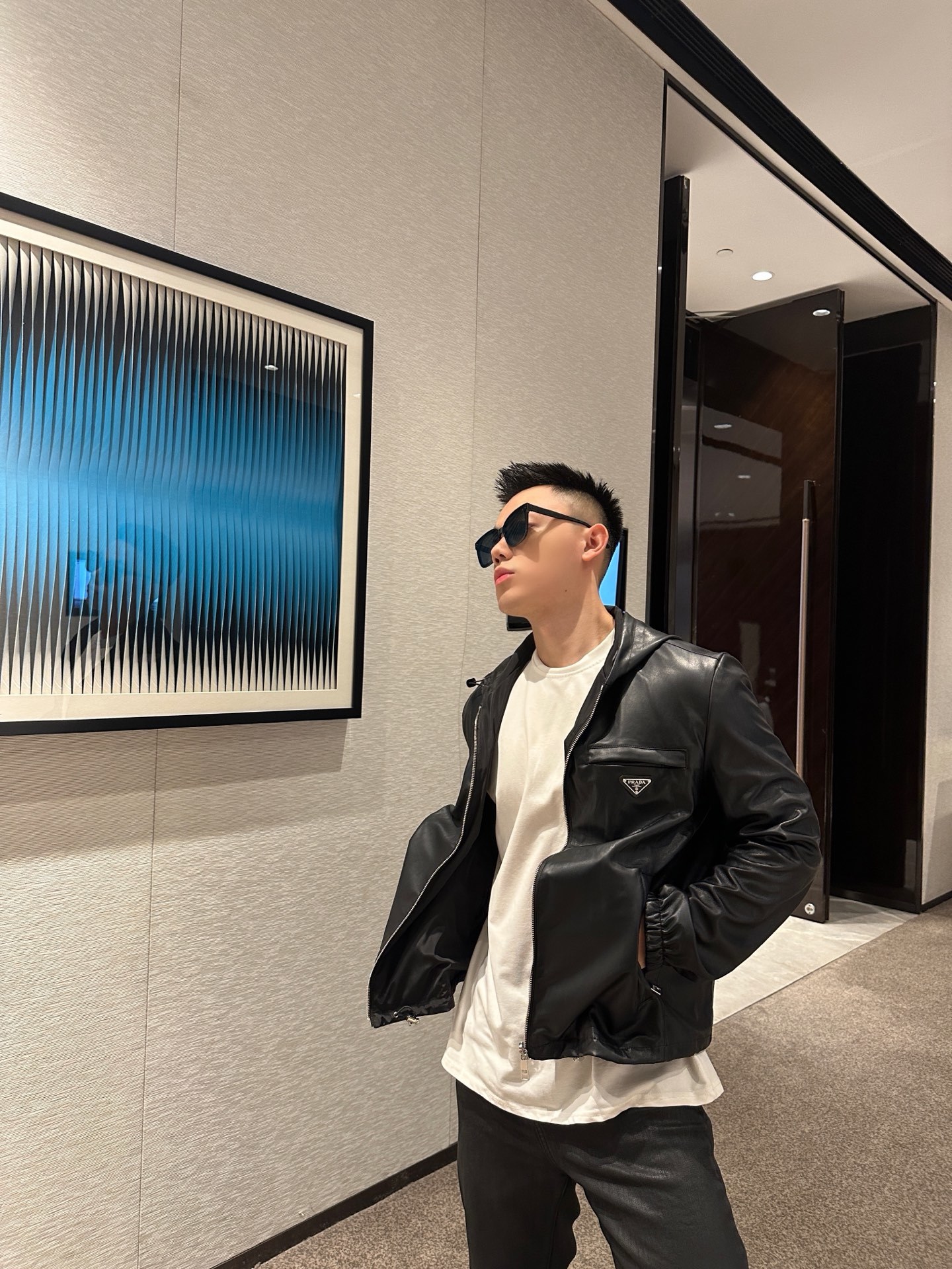 Prada 双面穿皮革尼龙连帽夹克